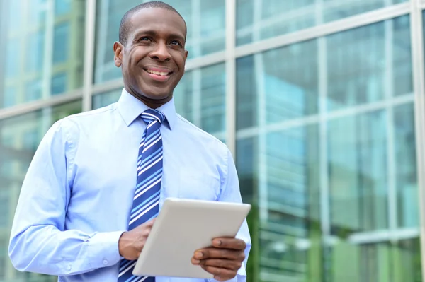 Male executive with digital tablet — Stock Photo, Image