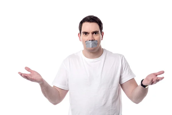 Man with mouth covered — Stock Photo, Image