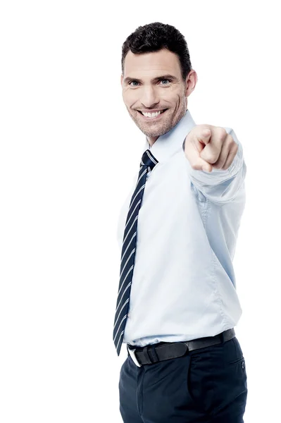 Male executive pointing towards camera — Stock Photo, Image