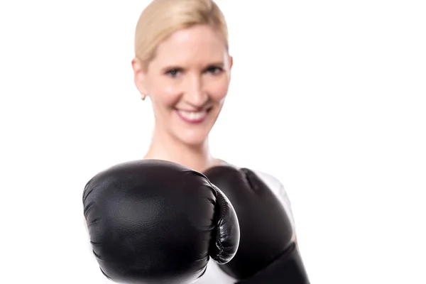 Woman with black boxing gloves — Stock Photo, Image