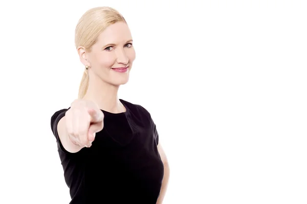 Woman pointing towards you — Stock Photo, Image