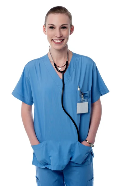 Female doctor with hands in pockets — Stock Photo, Image