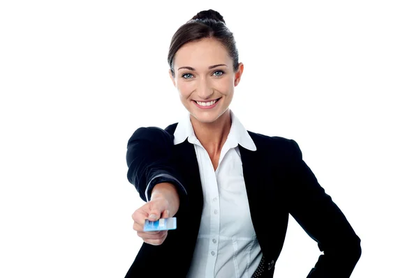 Corporate woman offering credit card — Stock Photo, Image