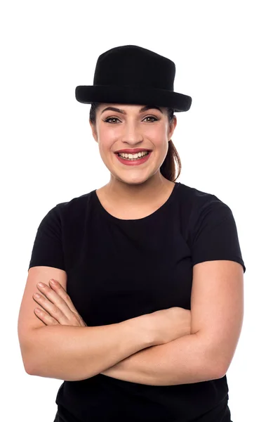 Woman with hat and folded arms — Stock Photo, Image