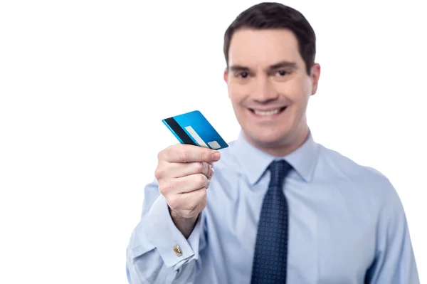 Male executive offering credit card — Stock Photo, Image