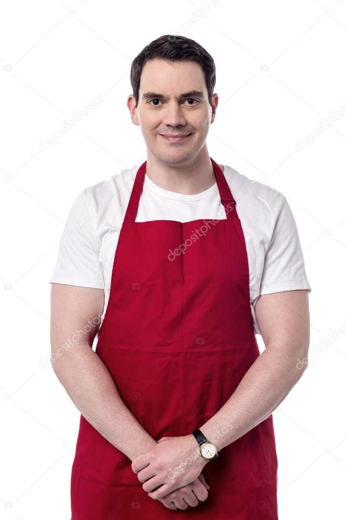 male chef with hands clasped
