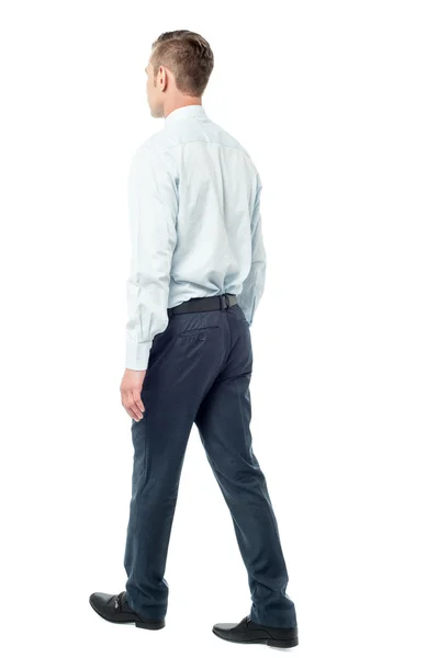 Back view of walking businessman — Stock Photo, Image