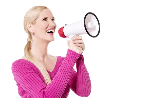 Woman making announcement with loudhailer — Stock Photo, Image