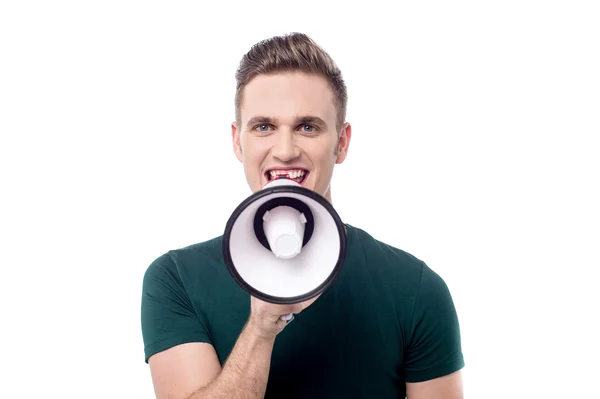 Man advertising with megaphone — Stock Photo, Image