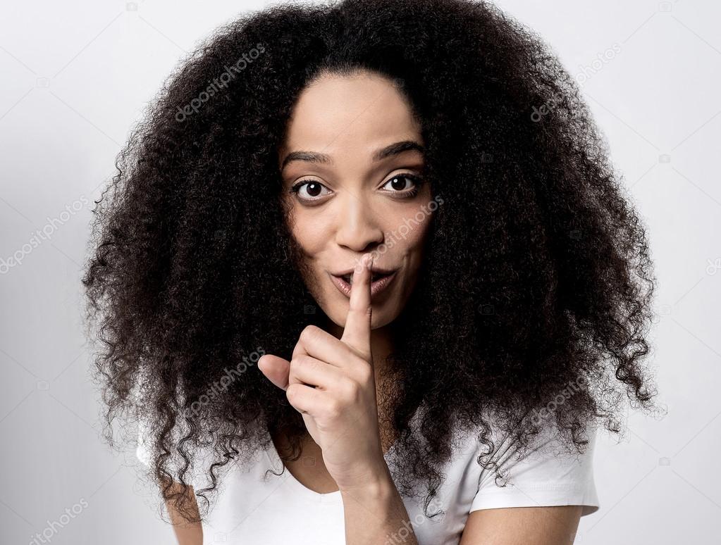 woman making a silence gesture