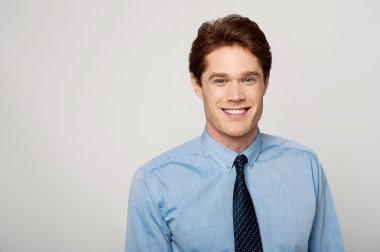 Young smiling male executive
