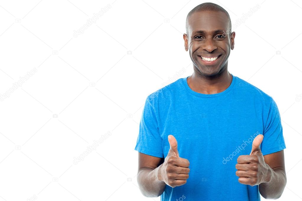 man showing double thumbs up