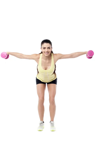 Mujer haciendo ejercicio con pesas —  Fotos de Stock