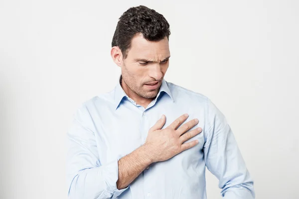 Man suffering from chest pain — Stock Photo, Image