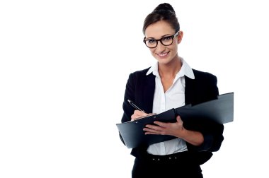 Happy female executive signing the new contract