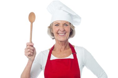 Experienced female chef posing