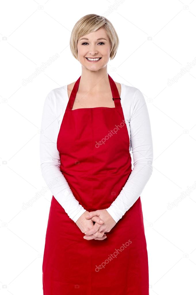 female chef with hands clasped