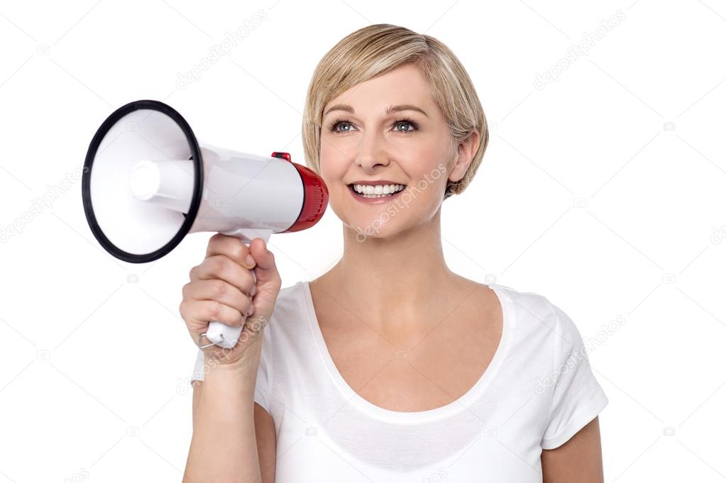 woman proclaiming into megaphone