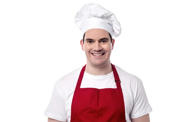 Chef masculino sonriente en delantal — Foto de Stock