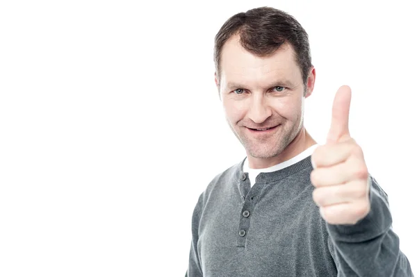 Man showing thumbs up gesture — Stock Photo, Image