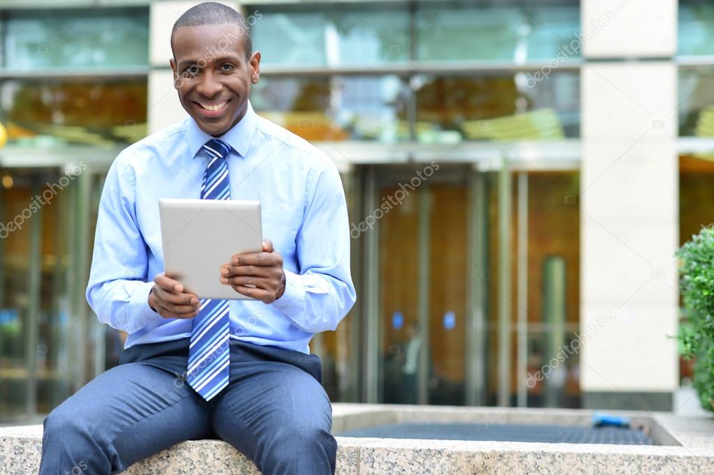 businessman with his new tablet pc