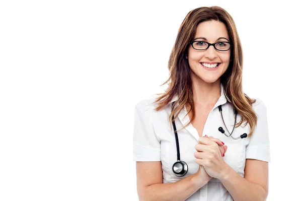 Female doctor with her hands clasped — Stock Photo, Image