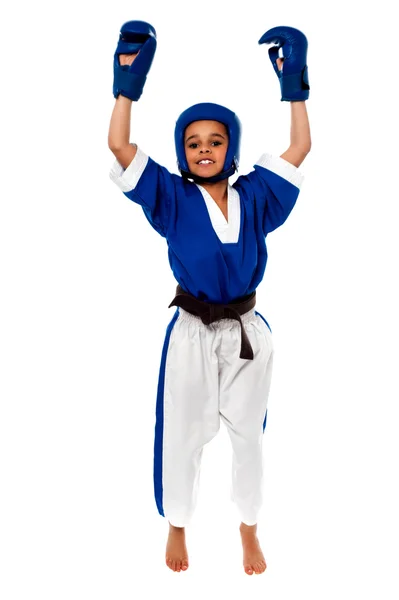 Karate girl with raised arms — Stock Photo, Image