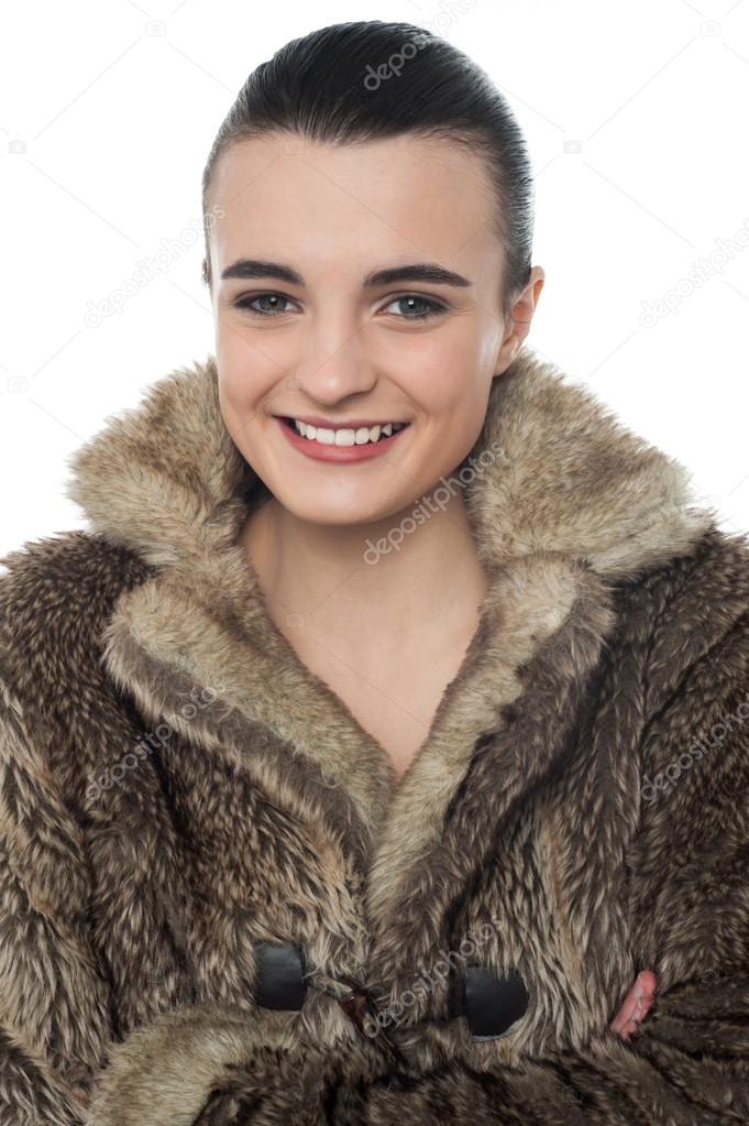 young girl in fur jacket
