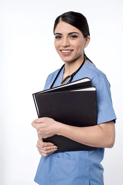 Physician with black file folders — Stock Photo, Image