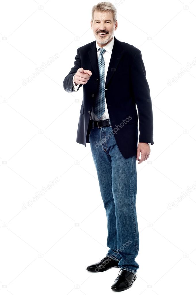 businessman pointing his finger to camera