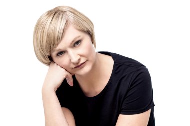 woman with a serious expression on face