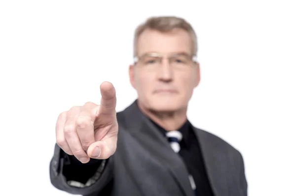 Businessman pointing towards camera — Stock Photo, Image