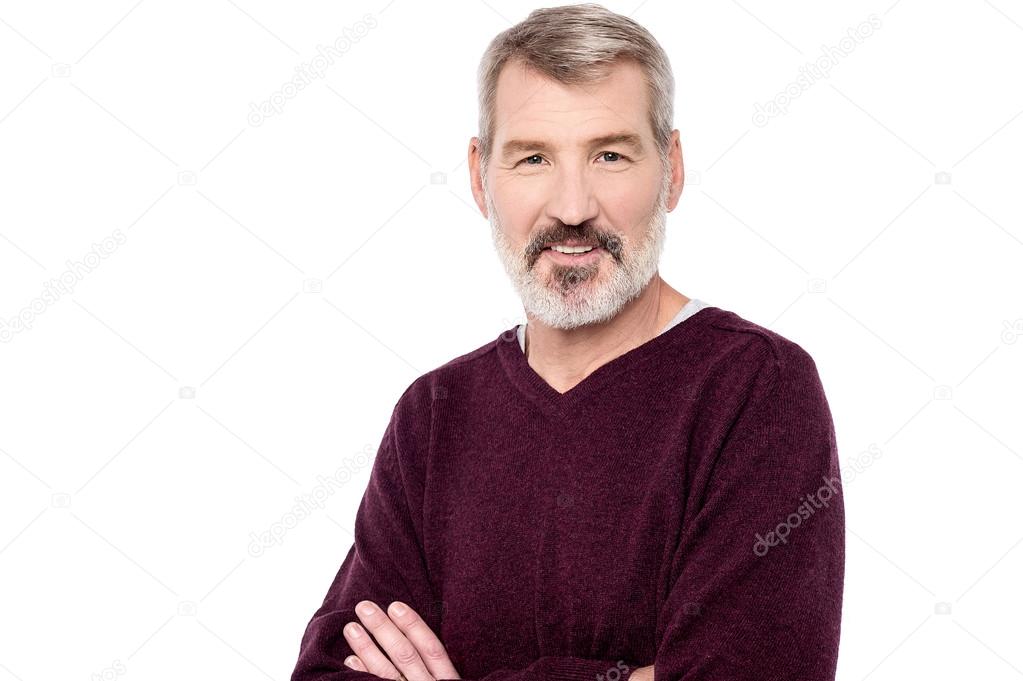 man posing with arms crossed