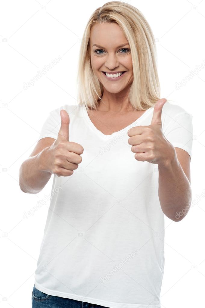 Woman showing double thumps up