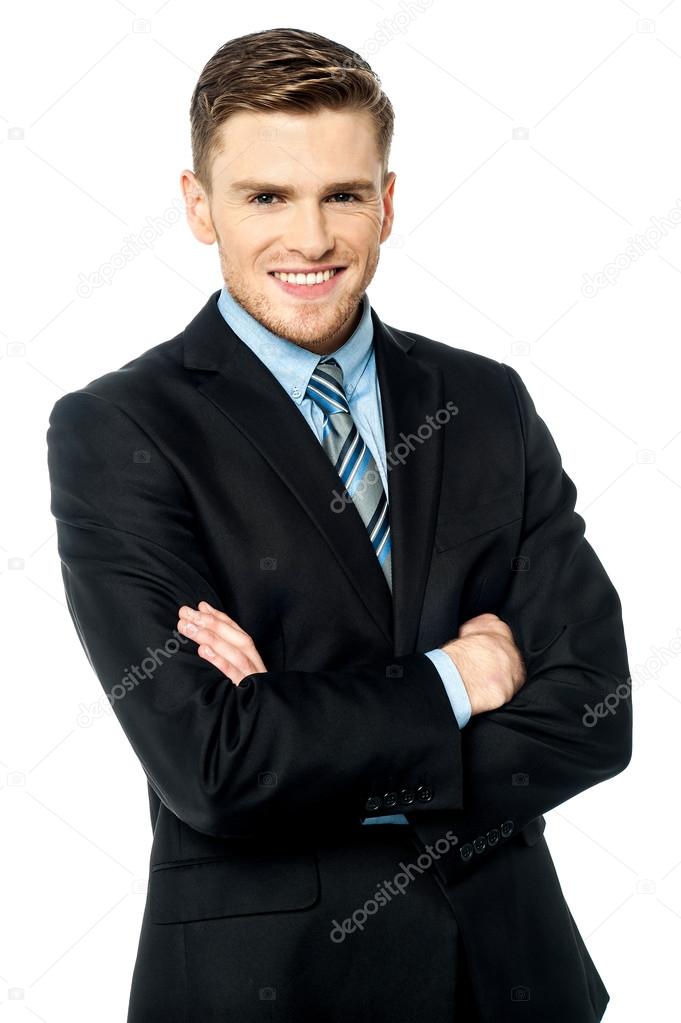 young businessman with arms crossed