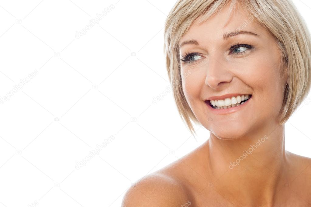 Topless smiling lady looking away