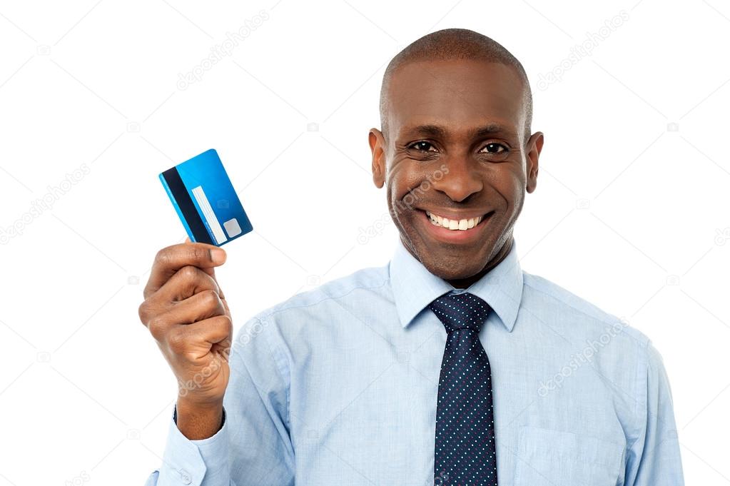 businessman showing credit card