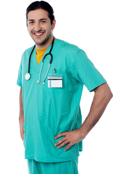 Cheerful doctor with hands on waist — Stock Photo, Image