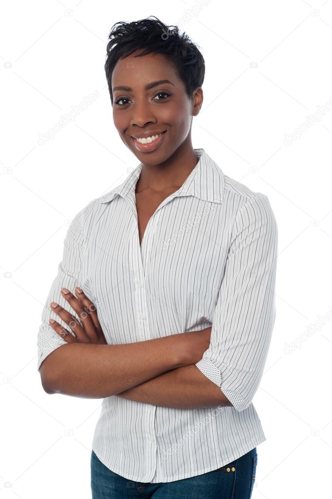 Smiling woman posing with arms crossed