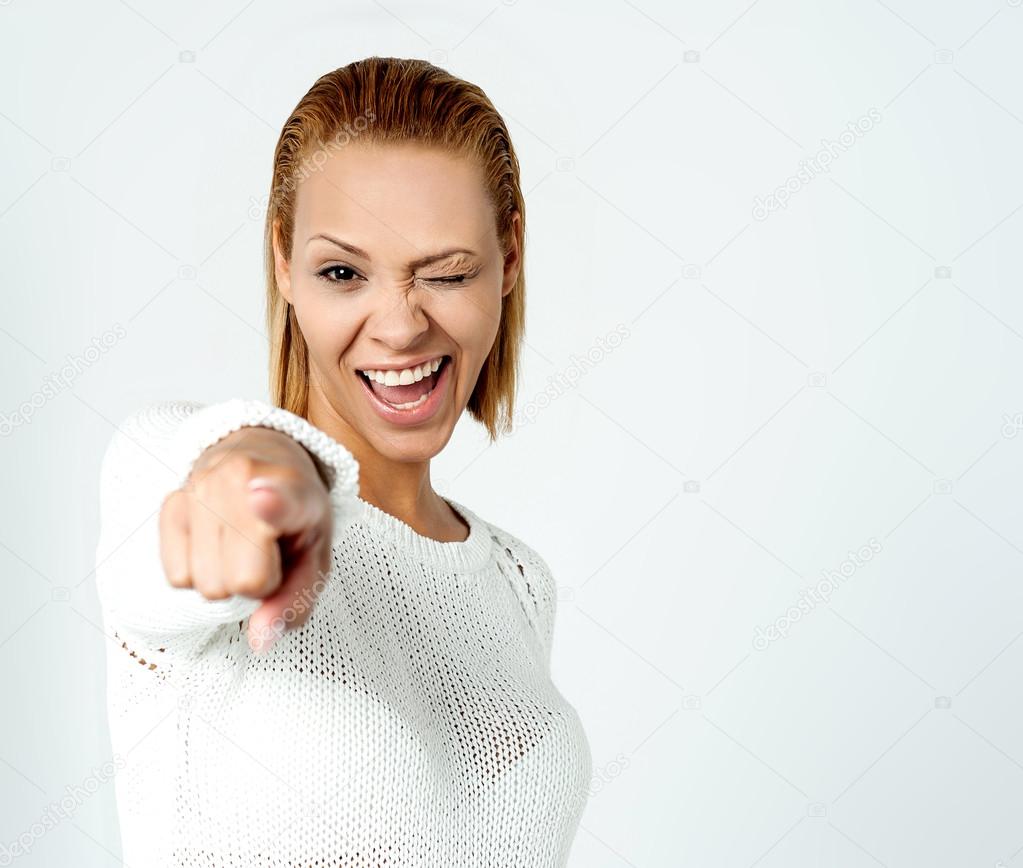 flirty woman pointing by hand
