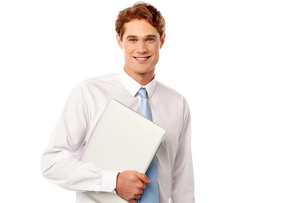 Businessman carrying laptop — Stock Photo, Image