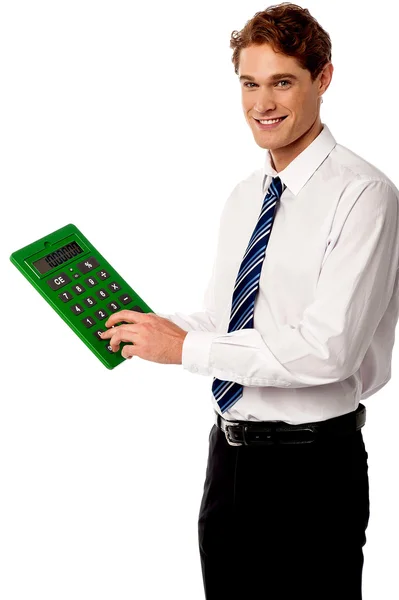 Employee using calculator — Stock Photo, Image