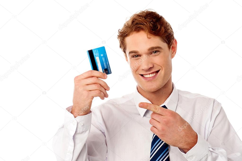 businessman showing credit card