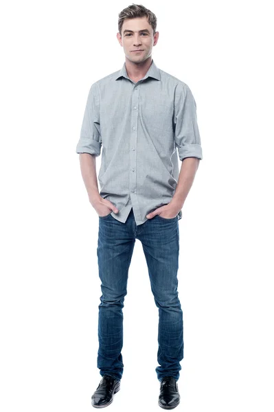 Handsome guy with hands in pockets — Stock Photo, Image