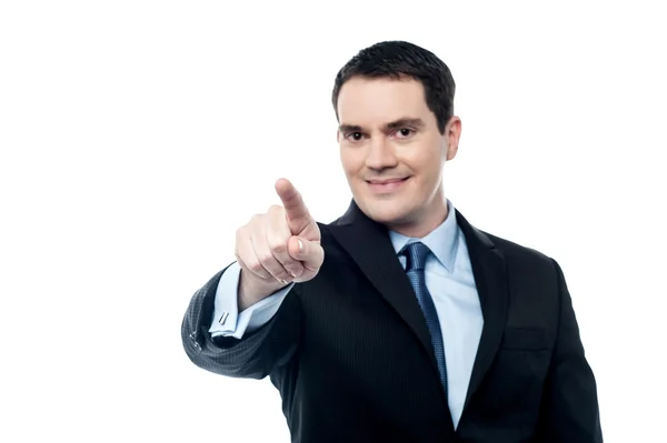 Businessman pointing finger at the camera — Stock Photo, Image