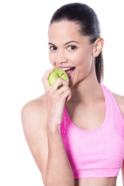 Žena jí zelené jablko — Stock fotografie