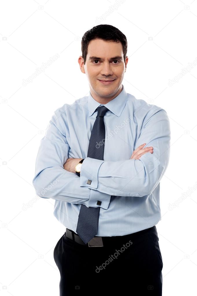 businessman posing with arms crossed