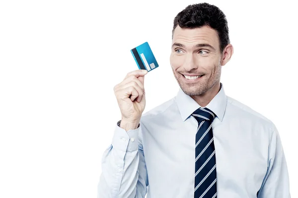 Businessman looking at his cash card — Stock Photo, Image