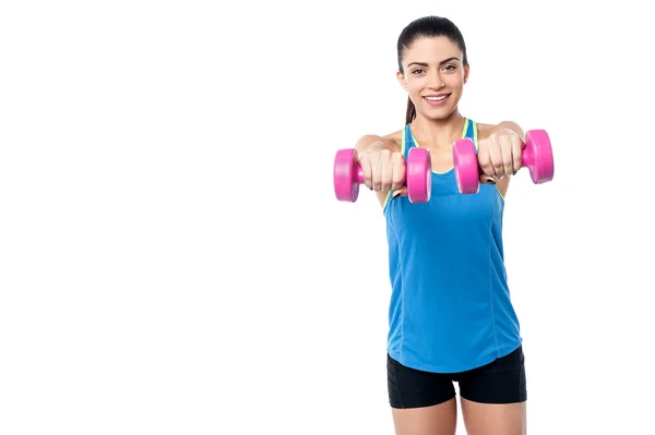 Hermosa mujer haciendo ejercicio con pesas —  Fotos de Stock