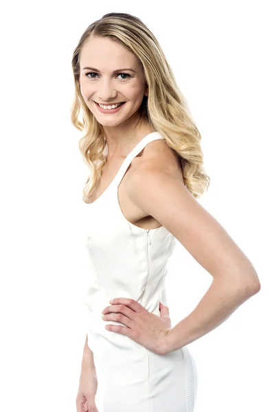 Smiling pretty woman in white dress — Stock Photo, Image